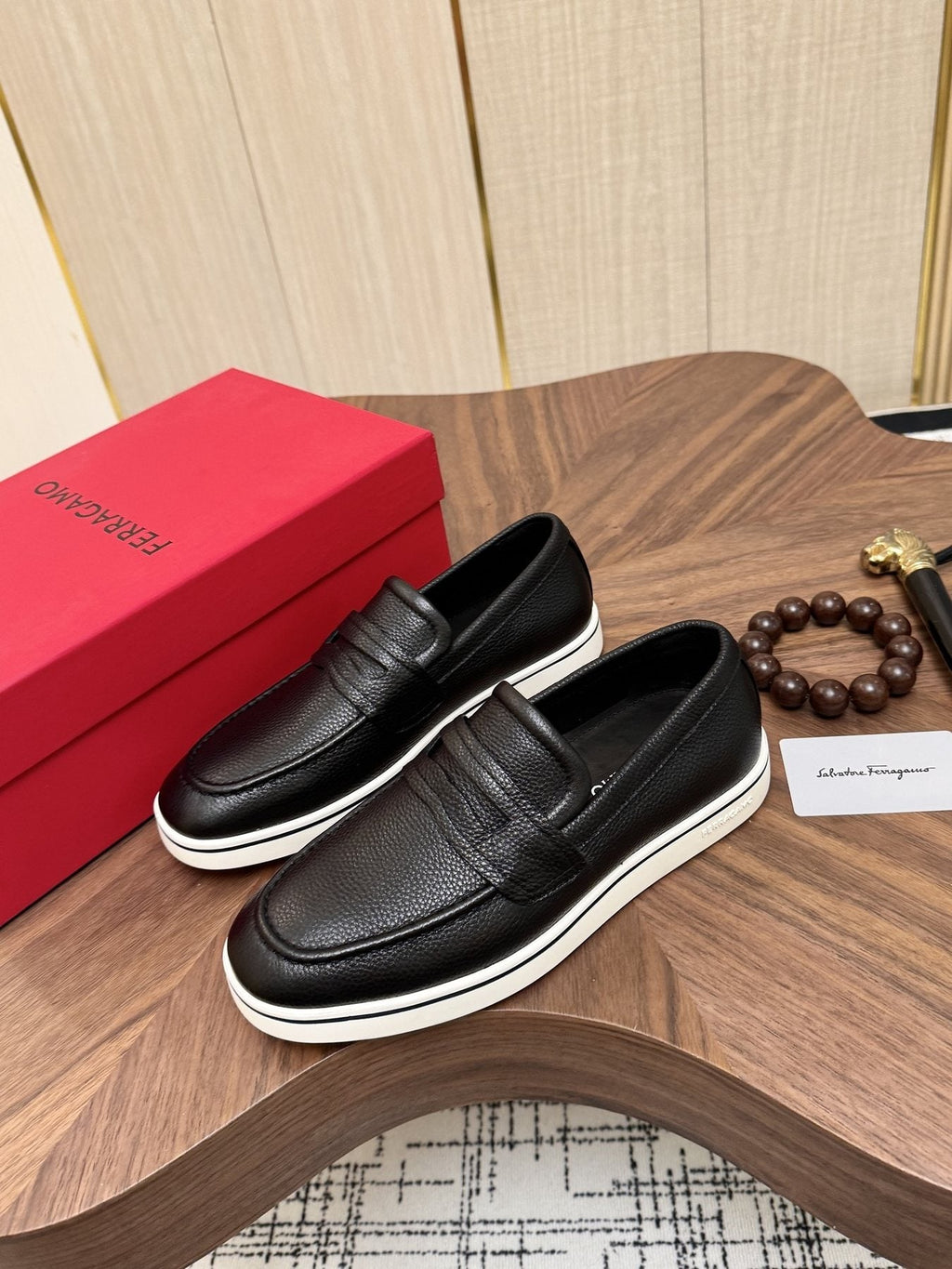 Salvatore Ferragamo Black Loafers with White Soles