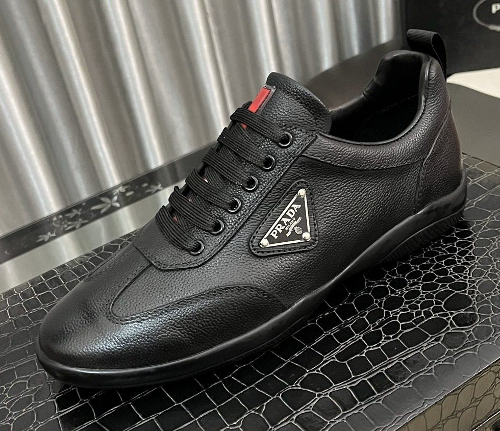 Prada Black Lace-Up Sneakers with Red Tab